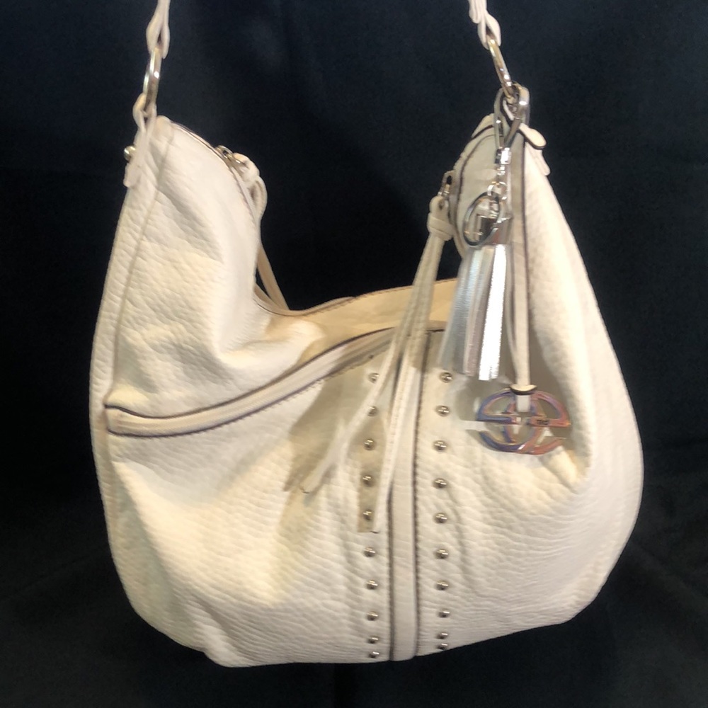 RED by Marc ECKO studded, white color Bag